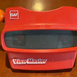 Vintage red GAF View-Master 3D stereo viewer from the 1970s