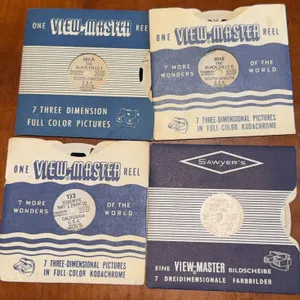 Four 1950s view master reels. Black Hills one and two, Yosemite Park three and the lost river