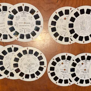 4 complete Disney view master sets w/ three reels