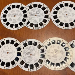 A lot of nine out of print View Master reels. With case.