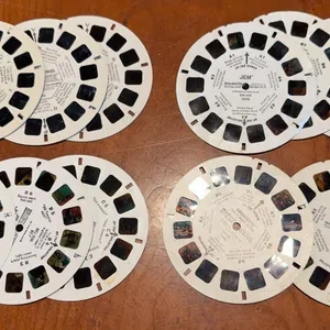 Three different complete view master Reel sets, and a lot of Smurf reels