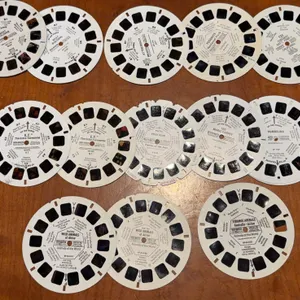 View master reels. They include ET Yogi Bear, strange animals, wild animals, and more.