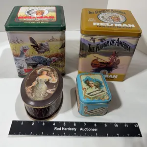 Collection of four vintage advertising tins