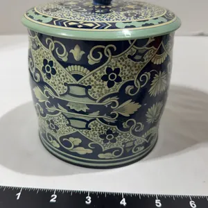 Vintage Delft-style blue and white floral metal tin canister