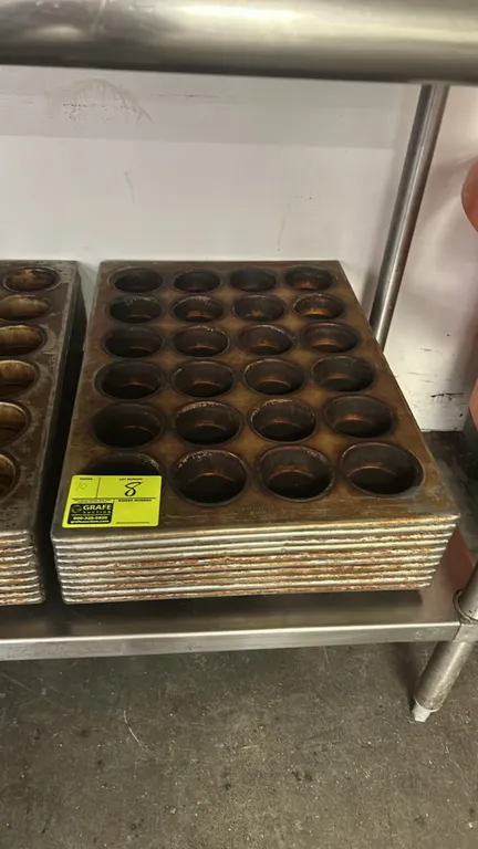 24-cup metal muffin pans. Features commercial metal construction with a 4 x 6 24-compartment layout.