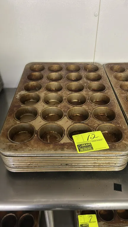 24-cup metal muffin pans. Features commercial metal construction with a 4 x 6 cup layout.