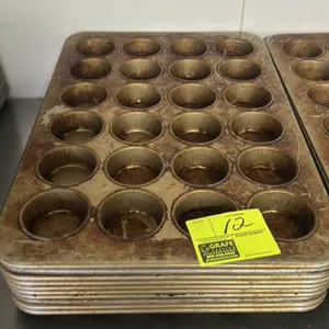 24-cup metal muffin pans. Features commercial metal construction with a 4 x 6 cup layout.