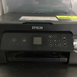 Epson Expression Home XP-3200 wireless all-in-one inkjet printer. Features digital control panel with color LCD screen, flatbed scanner, and PhotoCake
