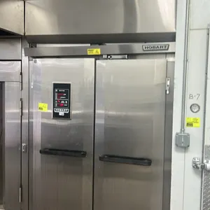 Hobart HP2 stainless steel 2-door roll-in proofer. Features digital controls for temperature, humidity, and timers, dual full-height doors, and interi