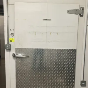 Kysor walk-in cooler. Features insulated foam panel construction, Bohn 2-fan evaporator unit, single hinged entry door with diamond plate kick plate, 