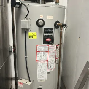 Bradford White Magnum Series commercial natural gas water heater. Features electronic digital temperature controls, automatic flue damper, and tempera