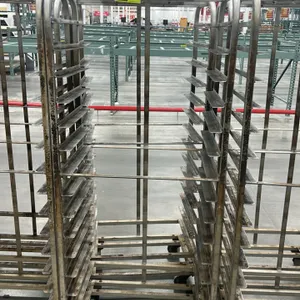 Aluminum full-size side-load roll-in oven racks. Features top lift bracket attachment, multi-tier angle slide runners, and welded aluminum constructio