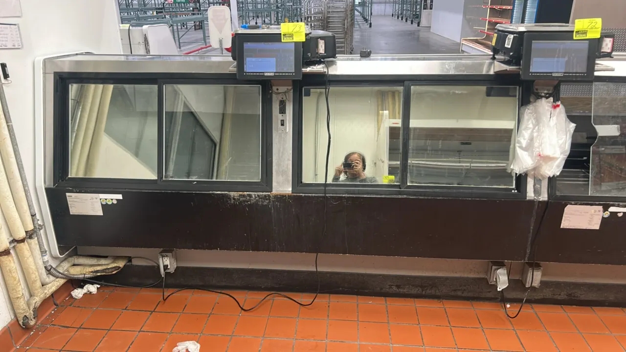Arneg CHICAGO 3 8' medium-temp deli service cases. Features curved front glass, rear sliding service doors, and poly case risers. Dimensions: 12'L and