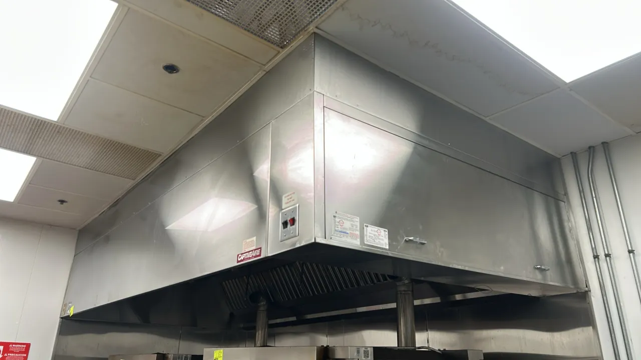 CaptiveAire 7824 ND stainless steel commercial ventilation hood. Features stainless baffle filters, integrated lighting fixtures, and fire suppression