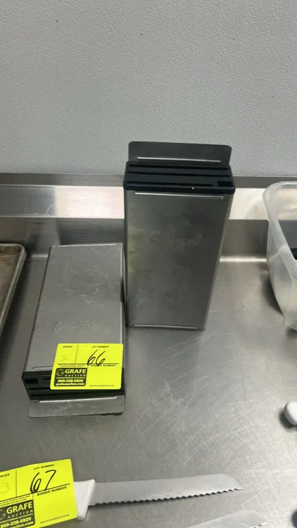 Edlund stainless steel knife blocks. Features stainless steel construction, black slotted top insert, and integrated wall mounting bracket. NSF certif