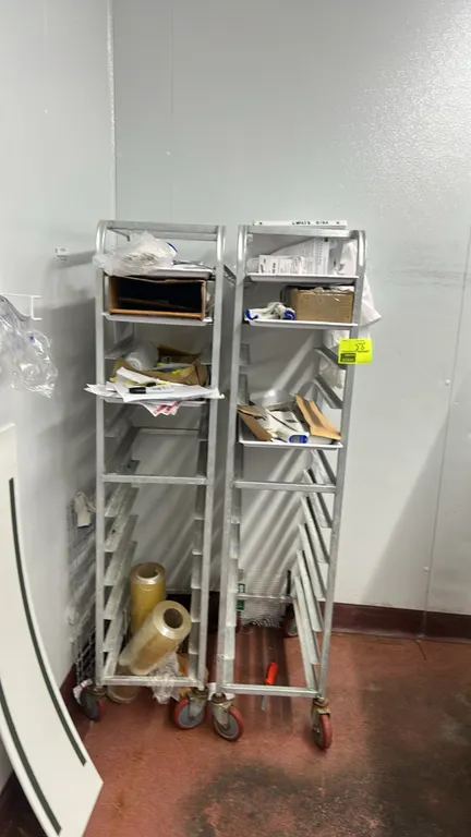 Aluminum full-size front-load channel racks. Features aluminum construction with channel slide runners. Mounted on swivel casters. Includes quantity o