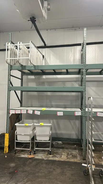 Interlake teardrop pallet racking. Features multi-tier storage and wire mesh decking. Includes (1) bay measuring 129"L x 44"W x 151"H with 6" crossbar