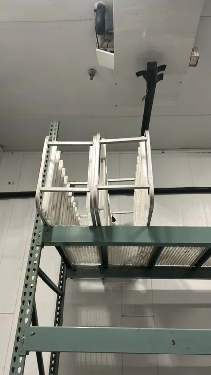 Aluminum full-size front-load channel pan racks. Features aluminum construction with welded side channel slides. Mounted on casters. Note: Pallet rack