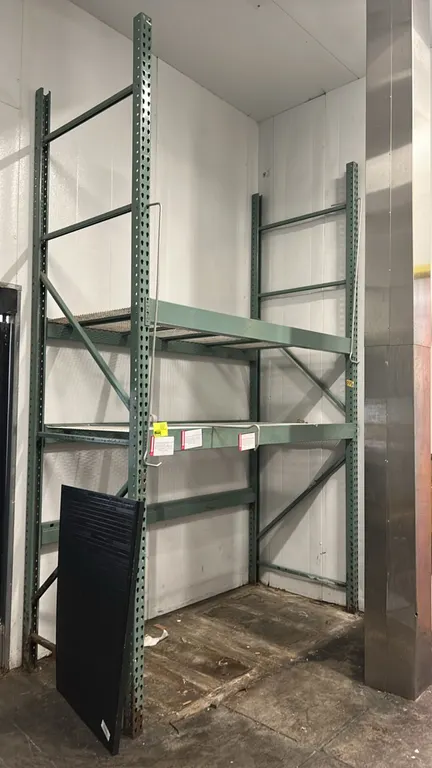Interlake multi-tier teardrop pallet racking. Features teardrop punch pattern uprights, 5" crossbars, and wire mesh decking. Dimensions: 90" x 44" x 1
