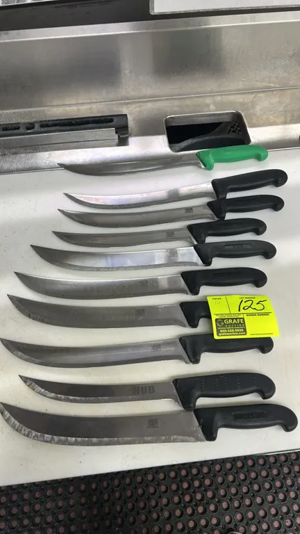 HUB Grinding stainless steel butcher knives. Features curved breaking and cimeter-style stainless steel blades with molded ergonomic composite handles