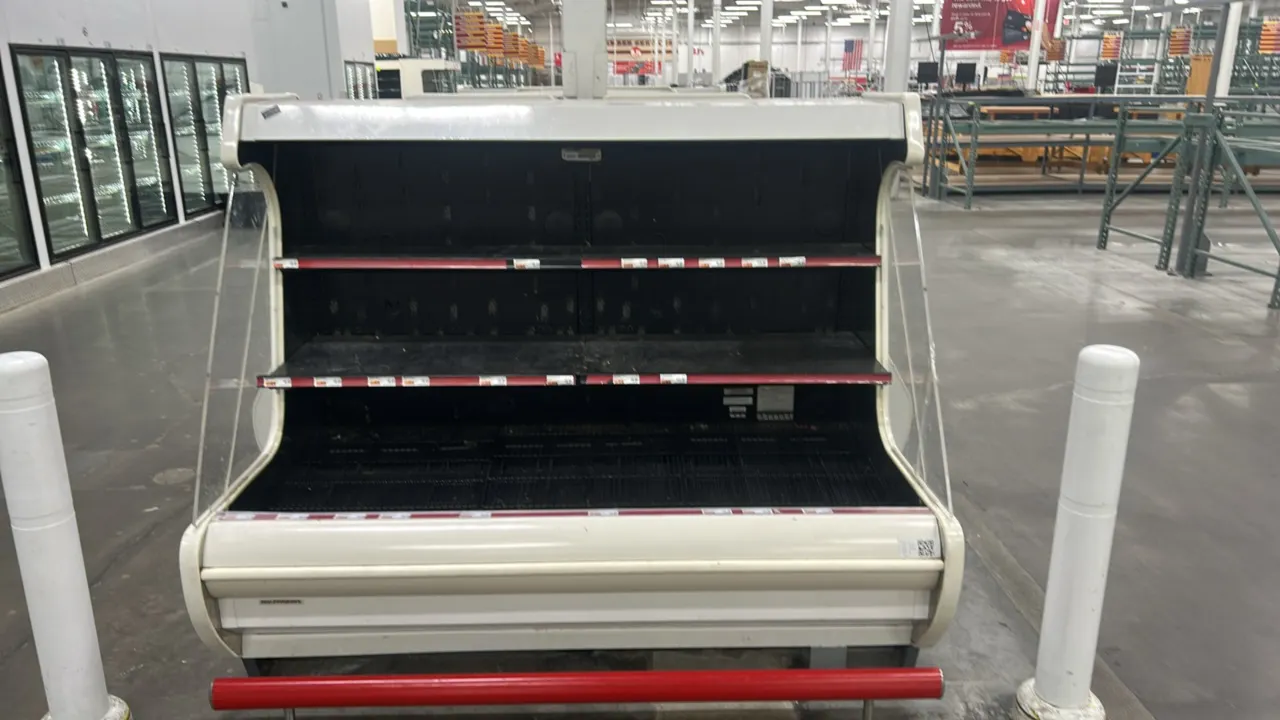 Hillphoenix O4UM6 open-air grab-and-go display case. Features two tiers of adjustable solid metal shelves with price tag moldings, lower wire deck, in