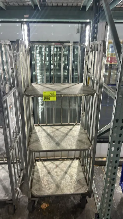 Metal multi-tier portable carts. Features 3-tier design with solid shelves and slatted metal side panels. 26" x 25". Mounted on casters.
