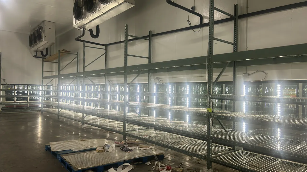 Interlake multi-tier teardrop pallet racking. Features teardrop uprights, 5" crossbars, and wire mesh decking. Dimensions: 128" x 44" x 151". Backgrou