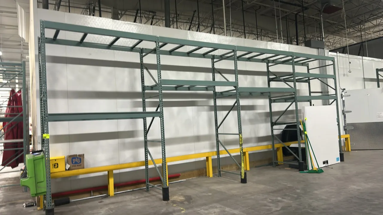 Interlake multi-tier teardrop pallet racking. Features teardrop punch design, 5" crossbars, and drop-in pallet cross supports. Dimensions: 90" x 44" x
