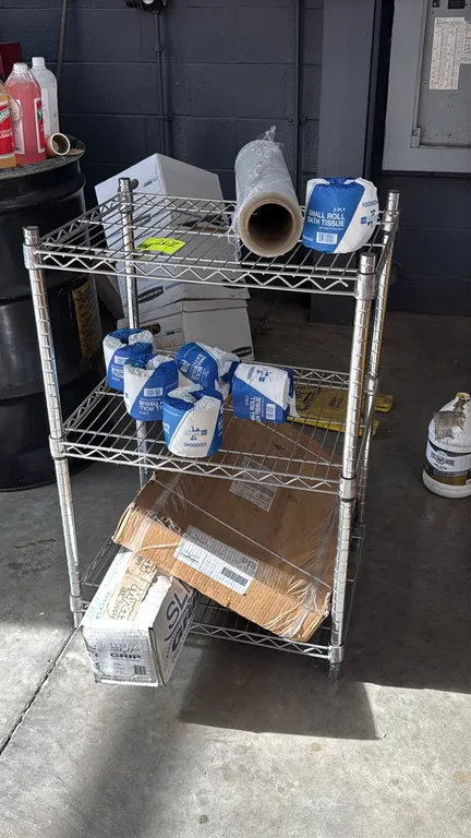 3-tier chrome wire shelving rack. Features adjustable wire shelves and tubular posts. 2'L. Contents not included.