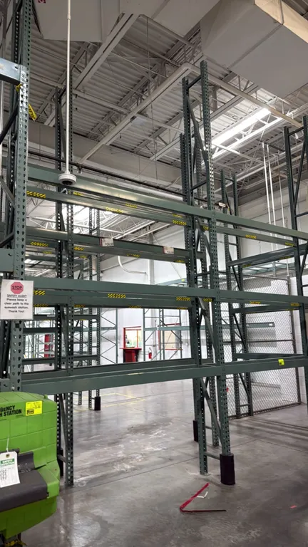 Interlake warehouse pallet racking. Features teardrop uprights and 4" cross beams. Dimensions: 7'6" x 1'6" x 17'H. Background equipment not included.