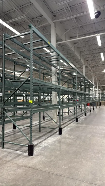 Interlake warehouse pallet racking. Features teardrop-style uprights, horizontal load beams, and cross support bars. Includes (1) 7'6"L bay and (5) 10