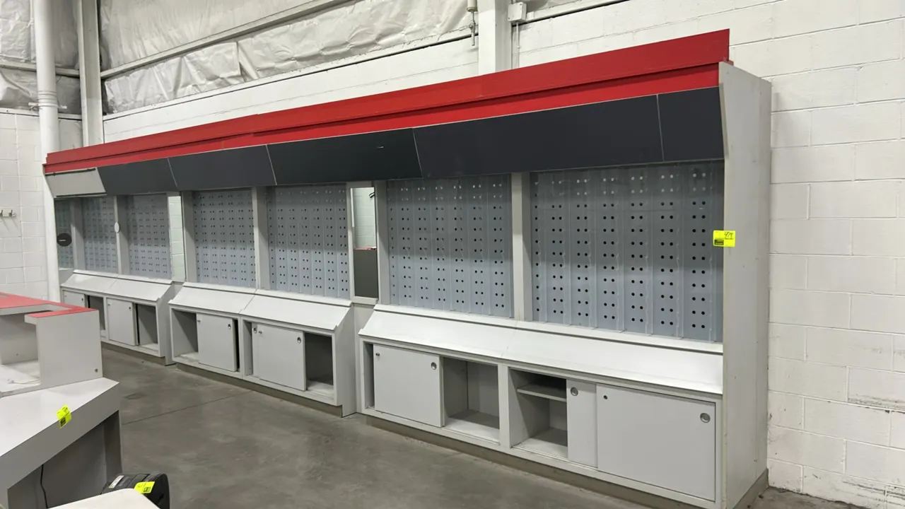 Laminate multi-tier eyeglass merchandiser. Features acrylic eyeglass display racks, integrated vertical mirrors, lower sliding-door base storage cabin