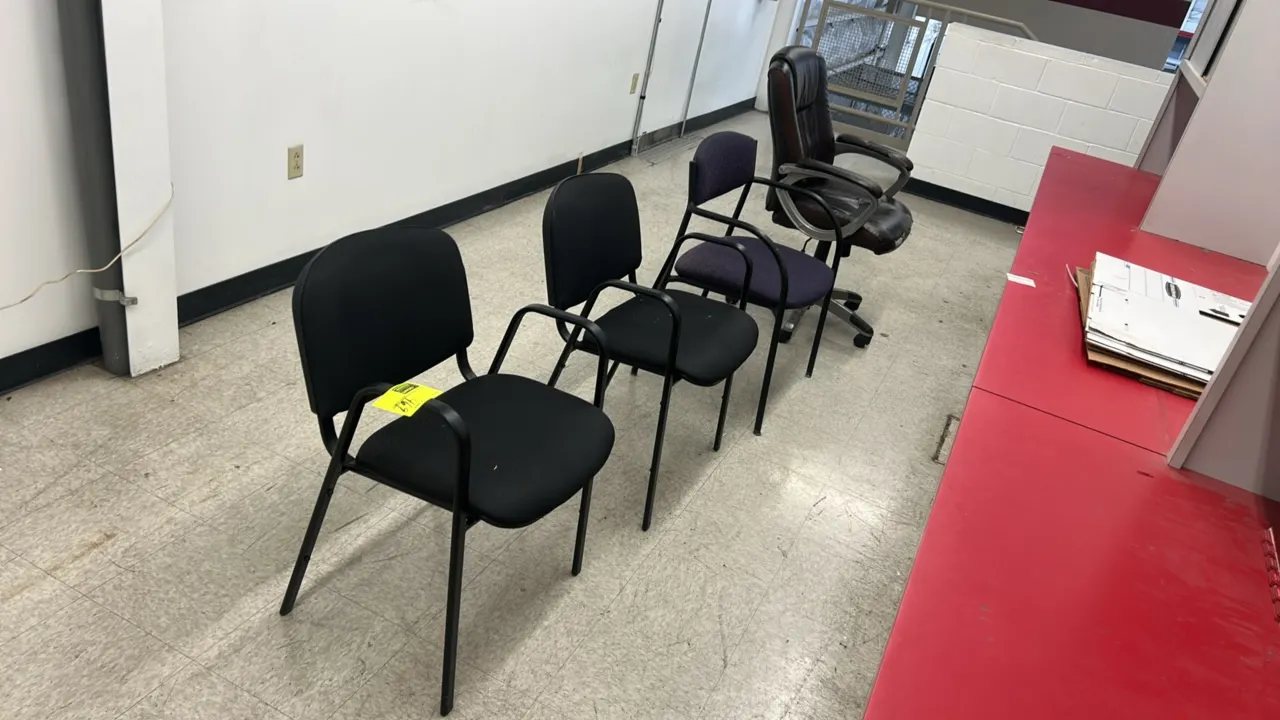 Assorted office chairs. Includes (3) upholstered guest armchairs with black metal frames and (1) executive swivel chair. Guest chairs feature fabric u