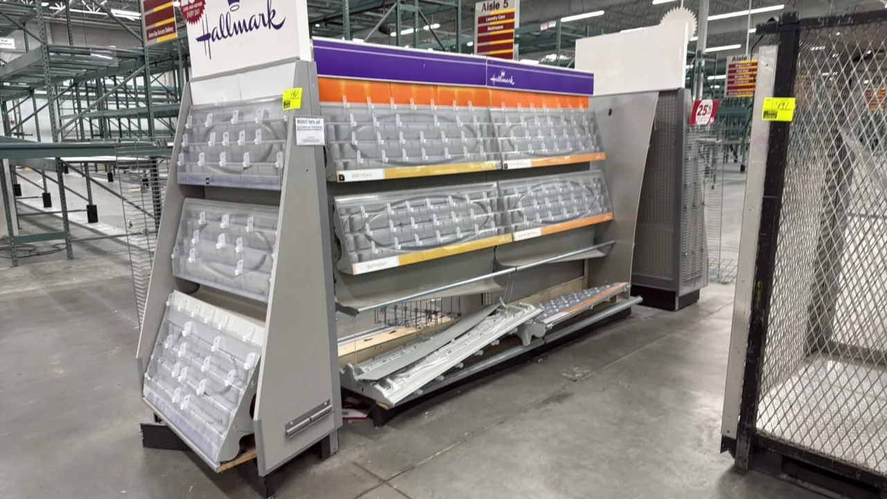 10'L of gondola-style card display racking. Features double-sided construction, tiered clear card display pockets, wire side/endcap display racks, and