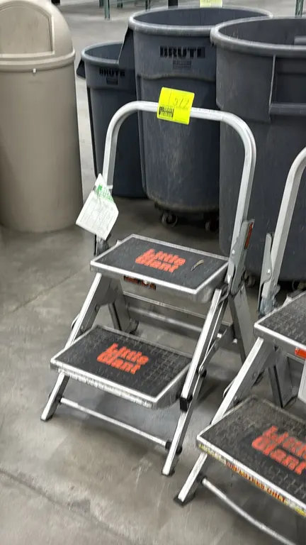 Little Giant aluminum 2-step stepladder. Features folding aluminum frame, two slip-resistant treaded steps, safety handrail, and rubber feet.