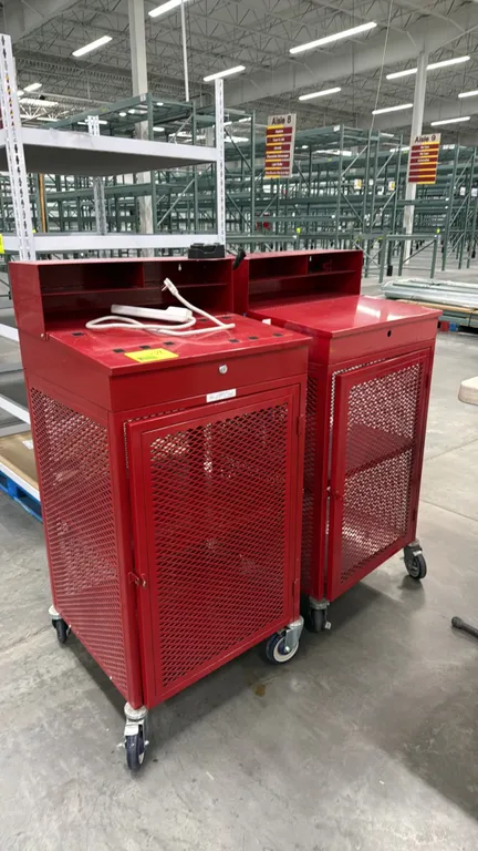 Portable metal receiving desks. Features sloped work surfaces with upper organizer risers, top drawer, expanded metal lower storage cabinets with inte