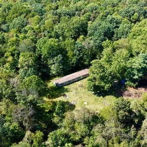 10.45 Acres mostly wooded with Waterfall.