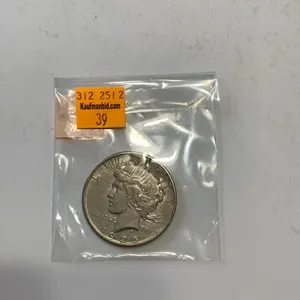 1 - 1925 Peace Silver dollar