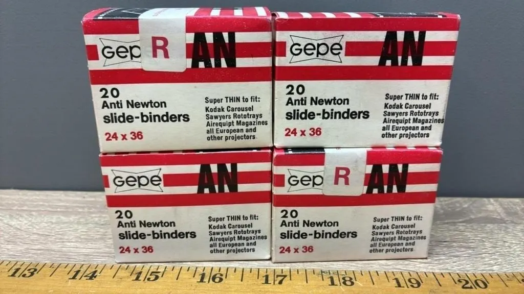 4 Boxes of Anti Newton Slide Binders.