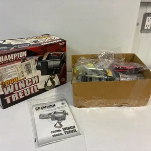 Champion 2000lb winch. 12 volt  Unused