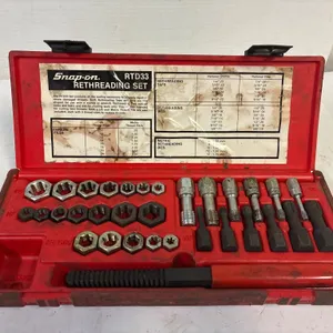 Snap-On rethreading set.