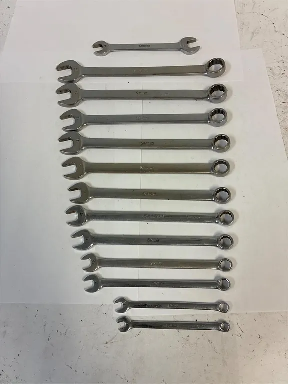 Snap On metric combination wrenches.
