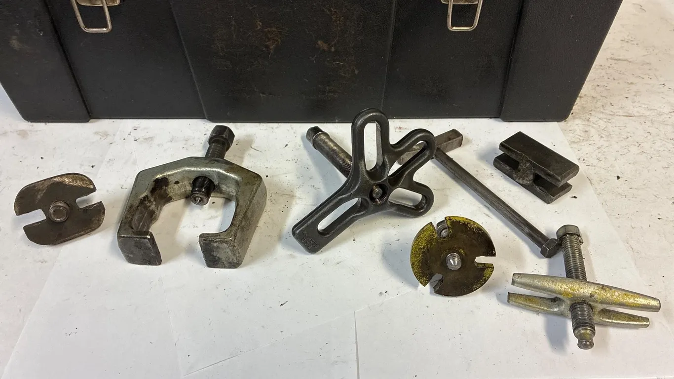 Pullers in a tool box.