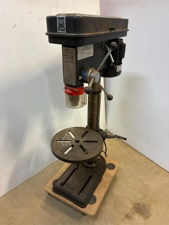Power Fist 16 speed drill press. Works.