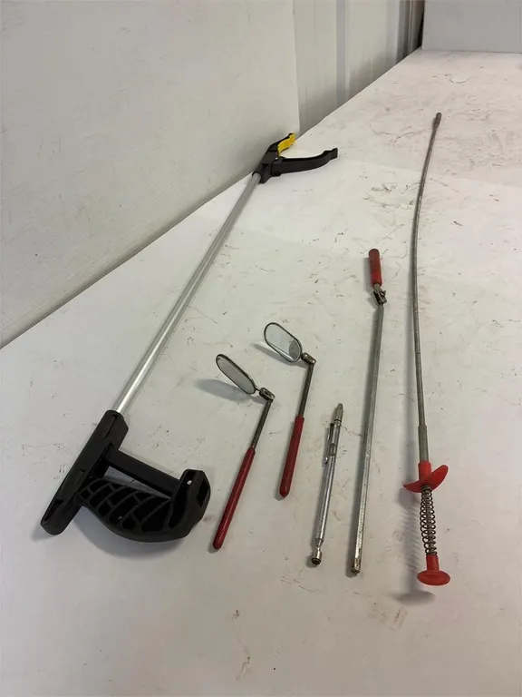 Magnets. Mirrors. Grabber tools.