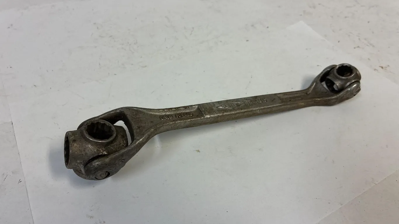 Dog bone SAE multi socket wrench.