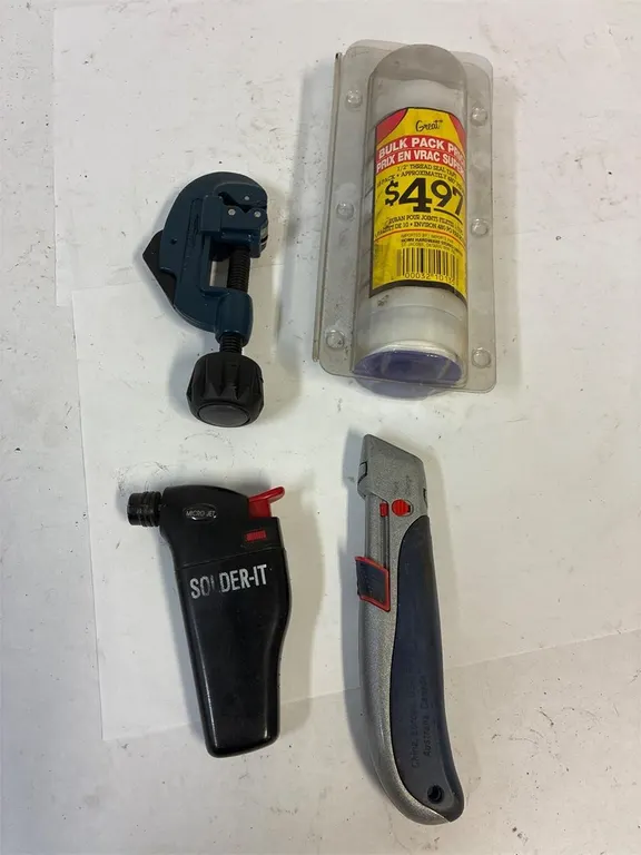 Pipe cutter. Micro-Jet. Teflon tape. Knife