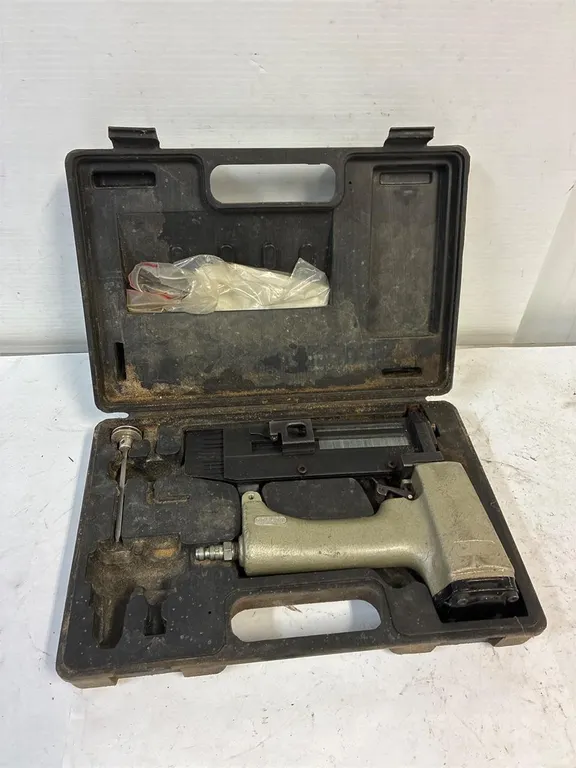 Air nailer. Will need cleaning.
