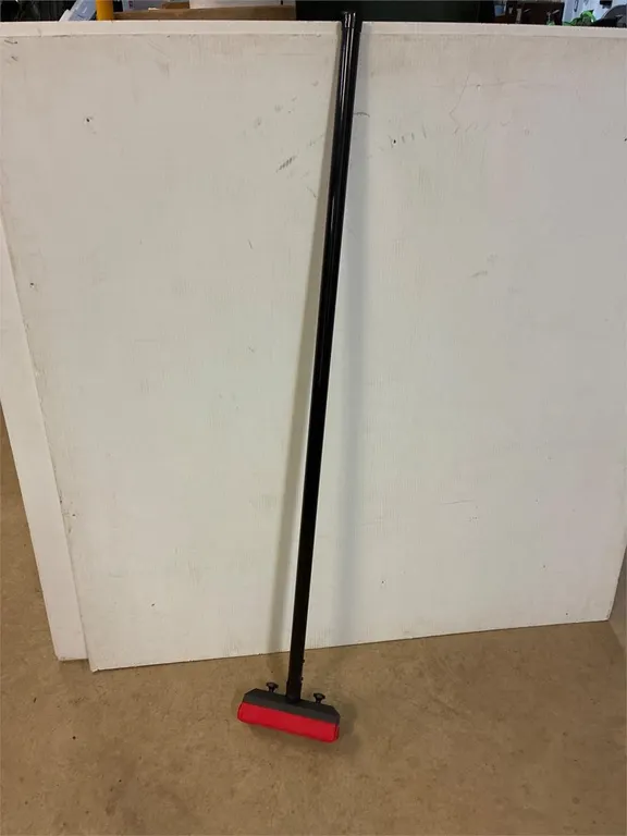 Lowry�s push Curling broom.