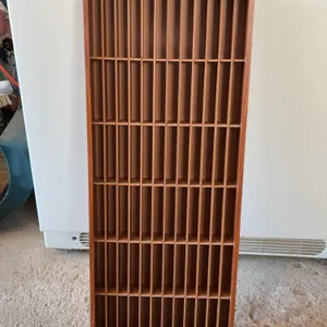 vintage wooden wall-mounted cassette tape storage rack